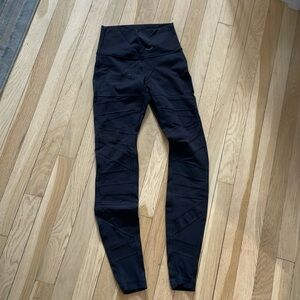 Lululemon black 5/8 leggings with mesh cutouts, size 4